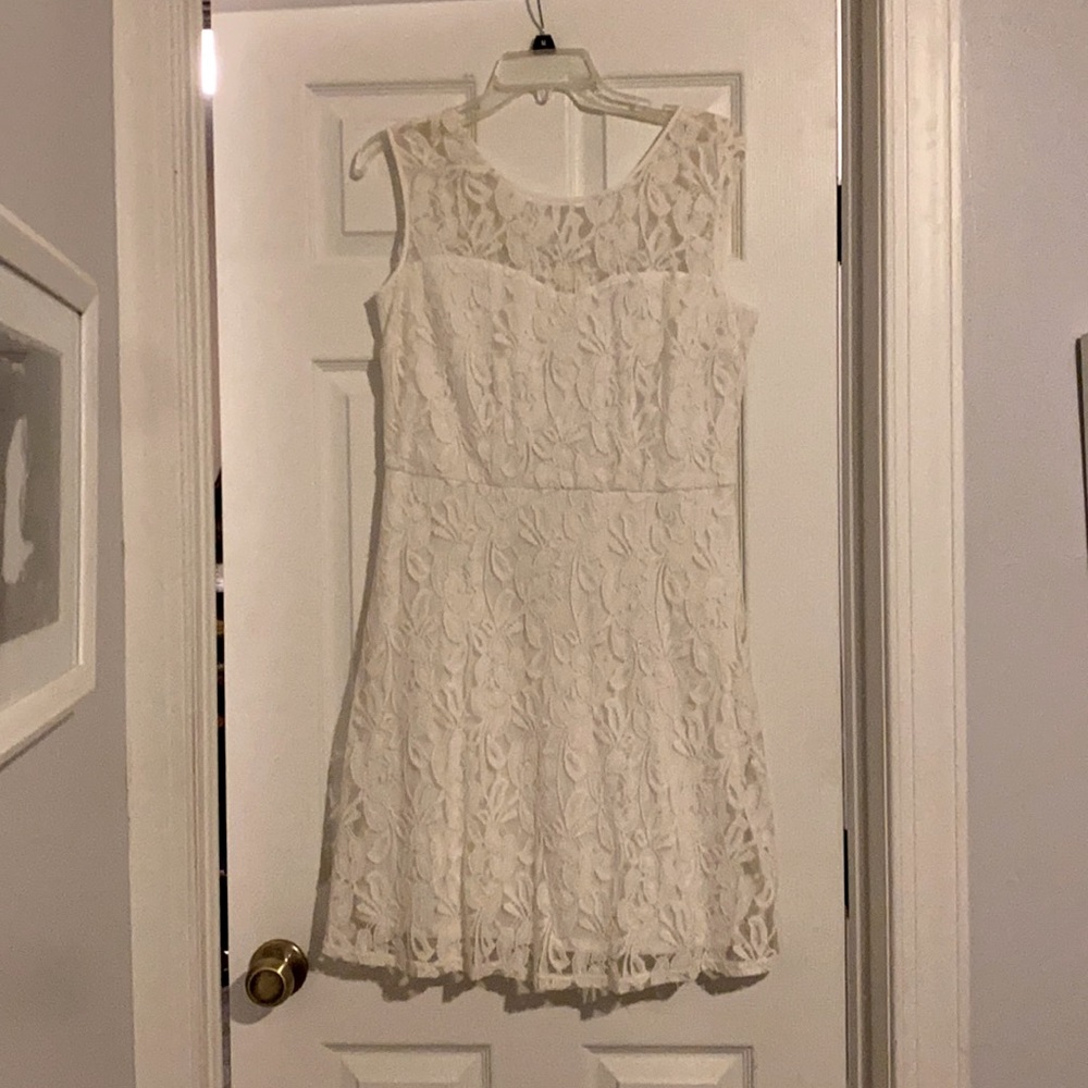 White lace dress. Knee length